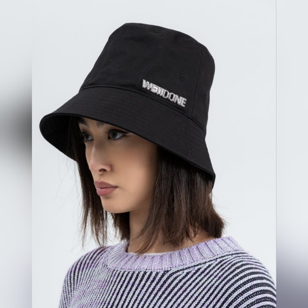 We11done  Metal Logo Bucket Hat in Black.